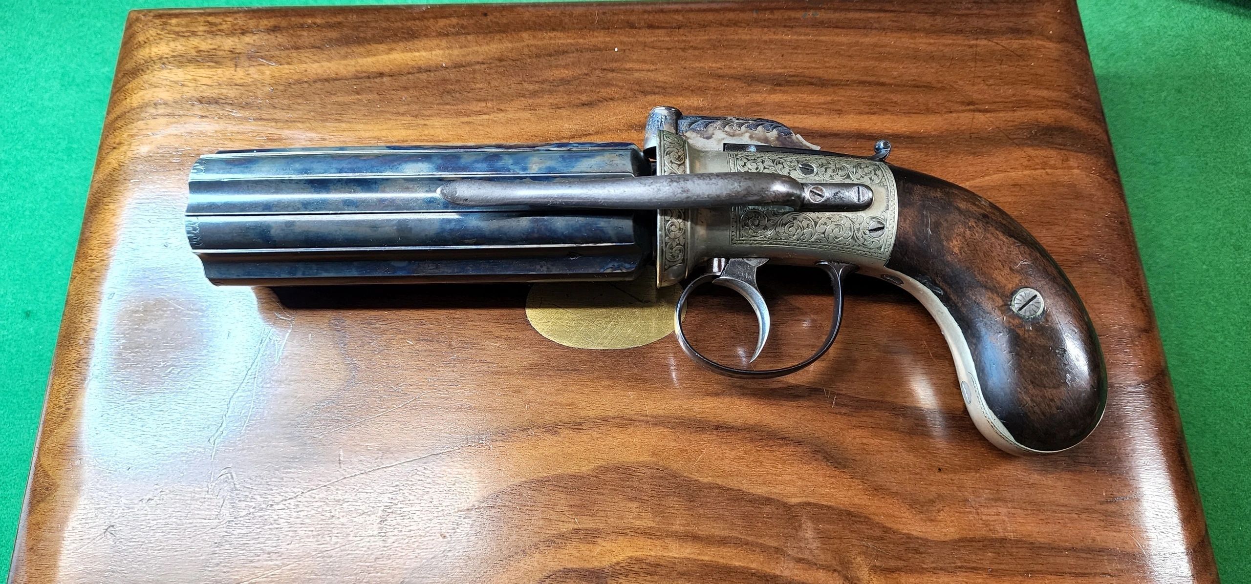 Pepper pot revolver resting on table