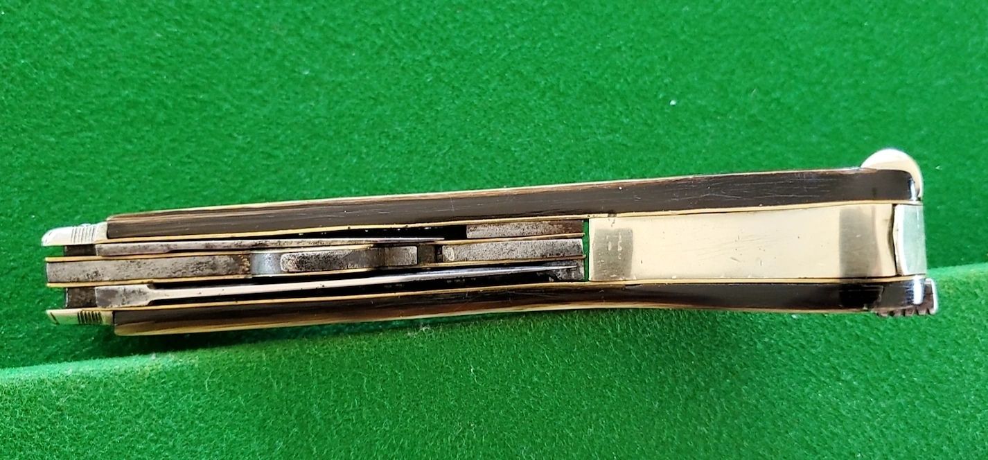 Compact view of knife pistol